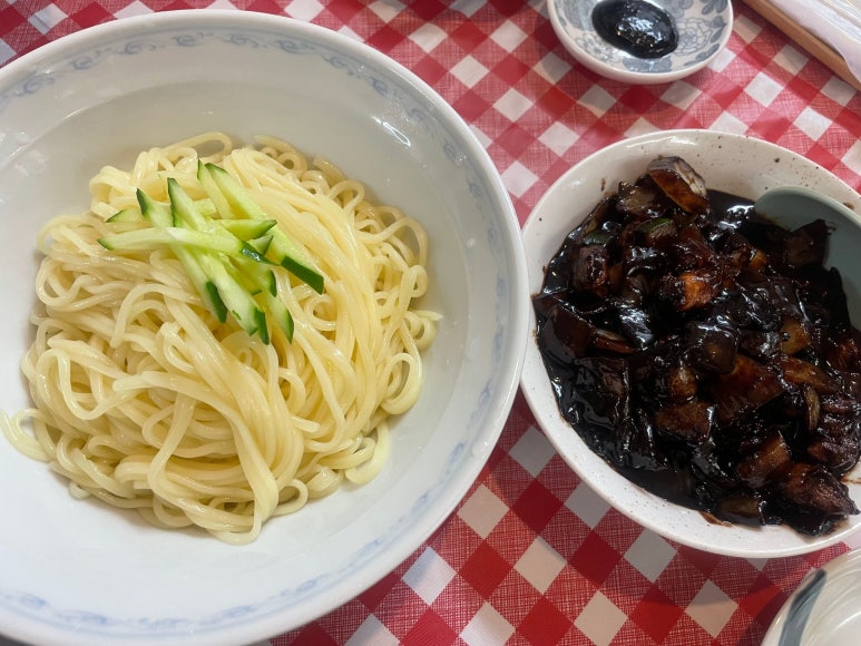 Ganjjajang with noodles and black bean sauce served separately