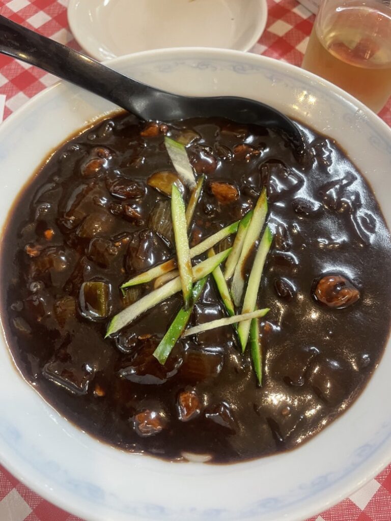 Bowl of Korean-Chinese jajangmyeon with black bean sauce at Nihao