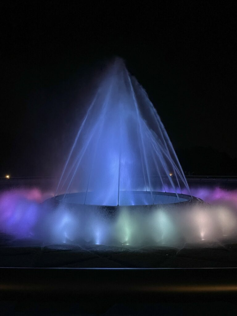 Sea Fountain at Moerenuma Park creating rainbow-lit arching water streams in the Arch Jet scene