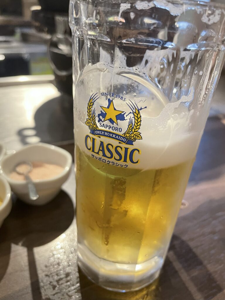 A glass of Sapporo Classic beer, served cold at a restaurant in Susukino, Hokkaido