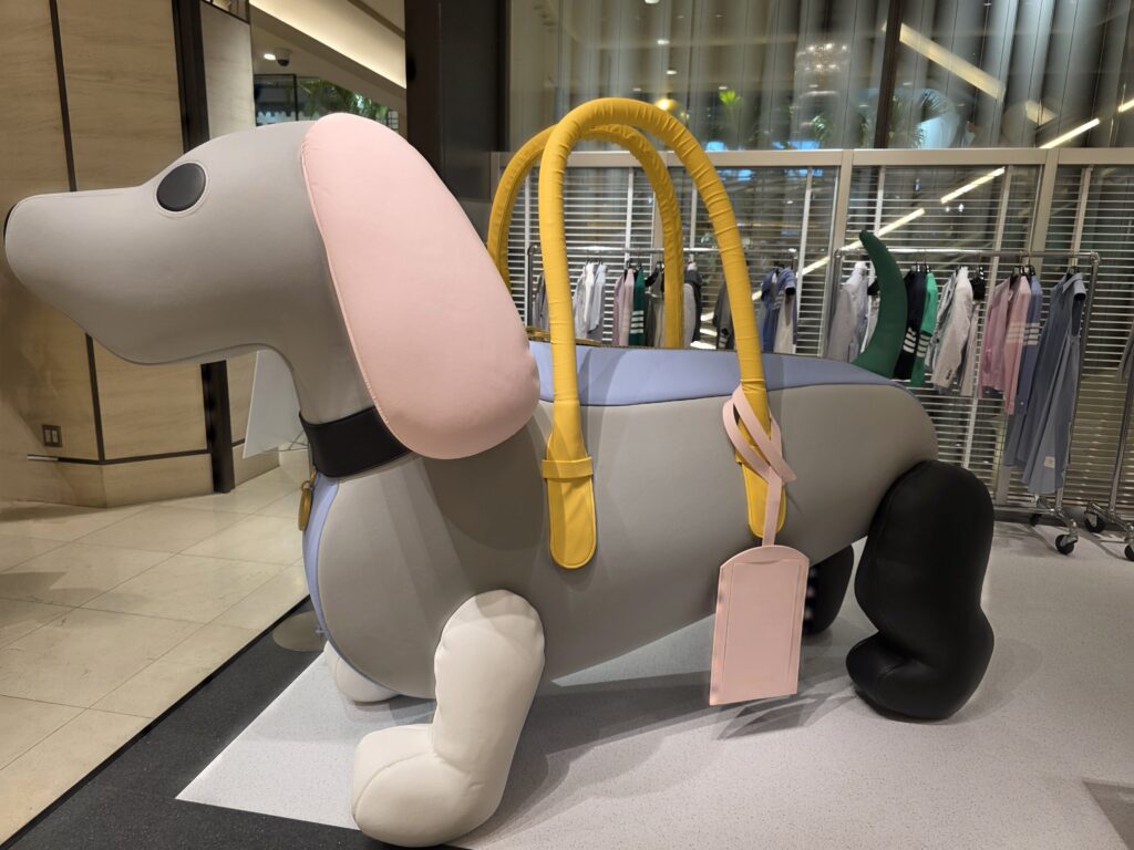 Side view of Hector bag design with colorful body and yellow handles