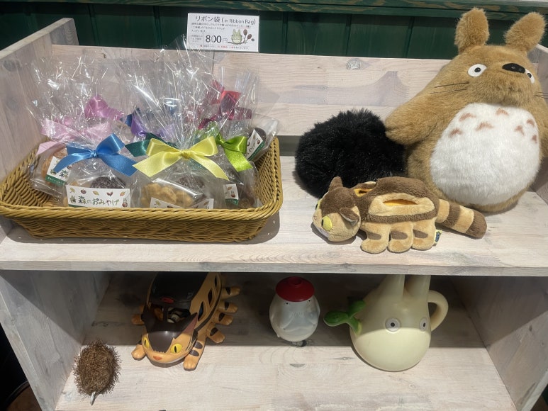 Acorn-shaped cookies and Totoro with Catbus dolls inside Shirohige’s Cream Puff Factory