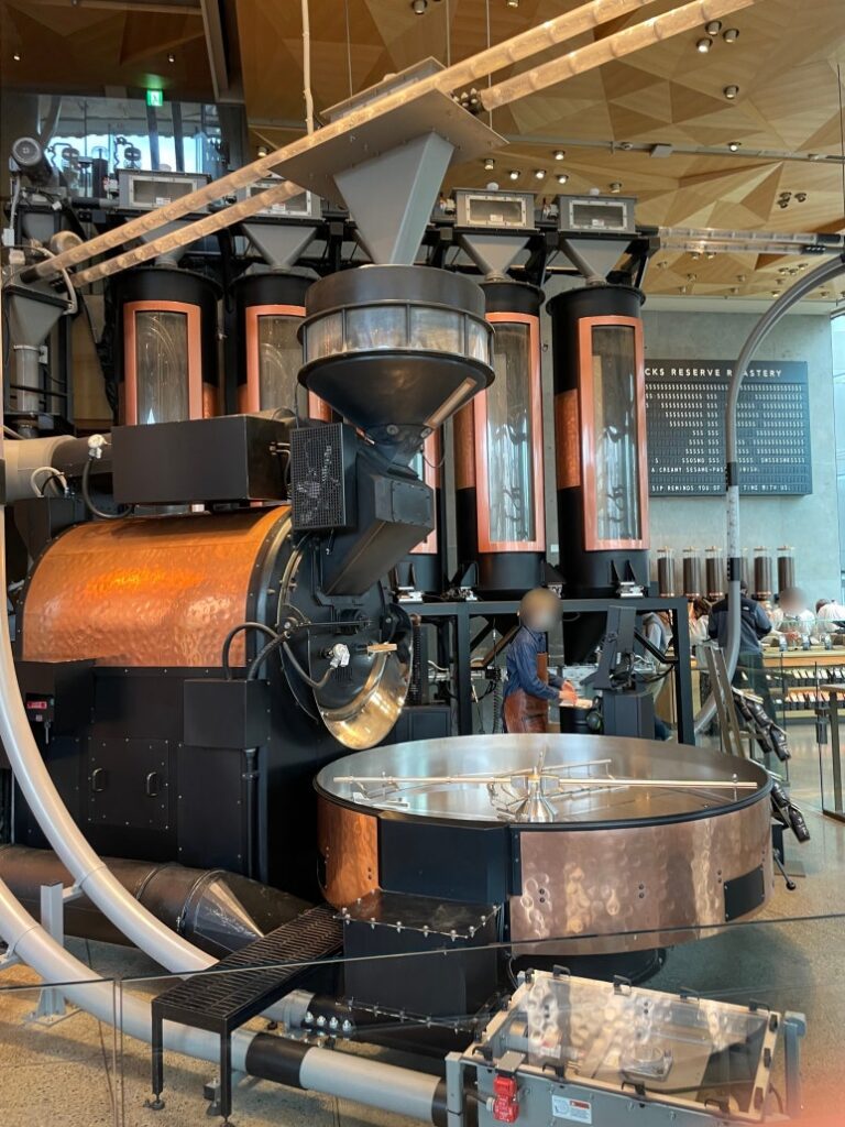Drum roaster, cooling tray, and freshly roasted beans