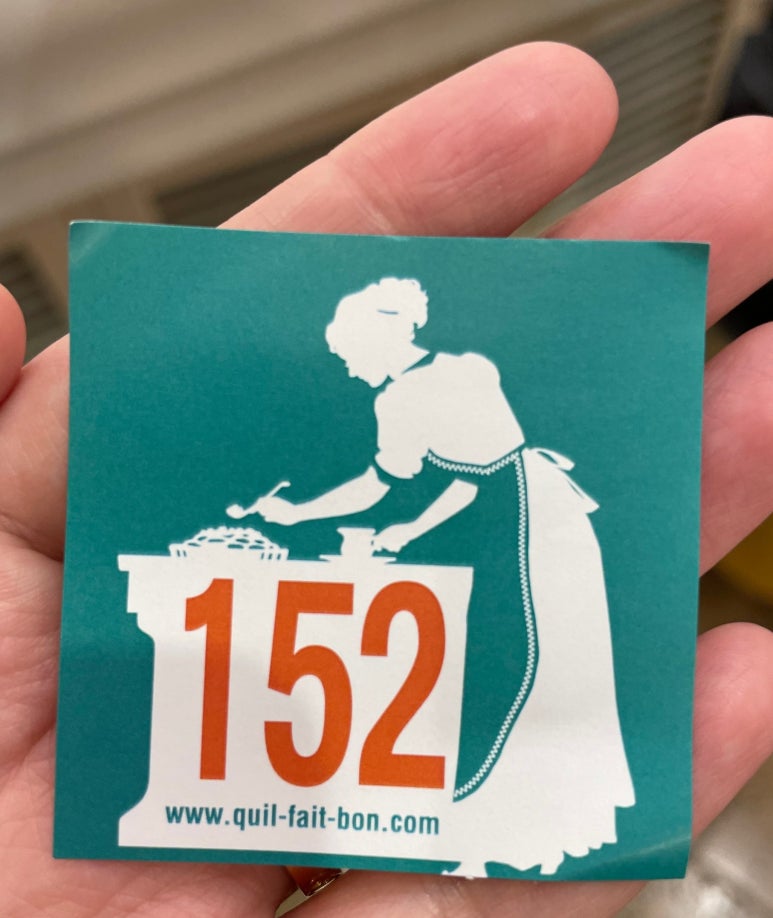 Takeout number ticket at Quil Fait Bon