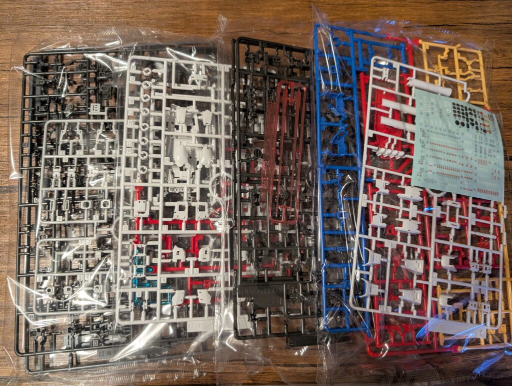 All runners and stickers included in an RG Gunpla kit