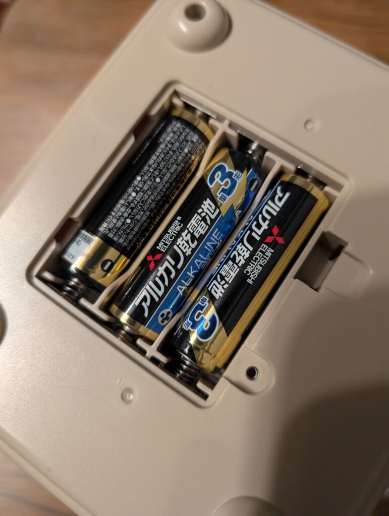 Battery compartment on the bottom of the electronic piggy bank