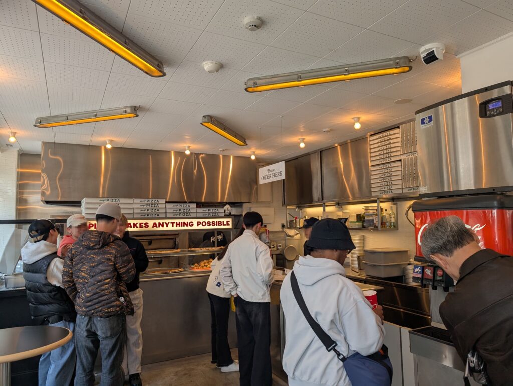 First floor interior of Henry’s Pizza with a clean and cohesive design