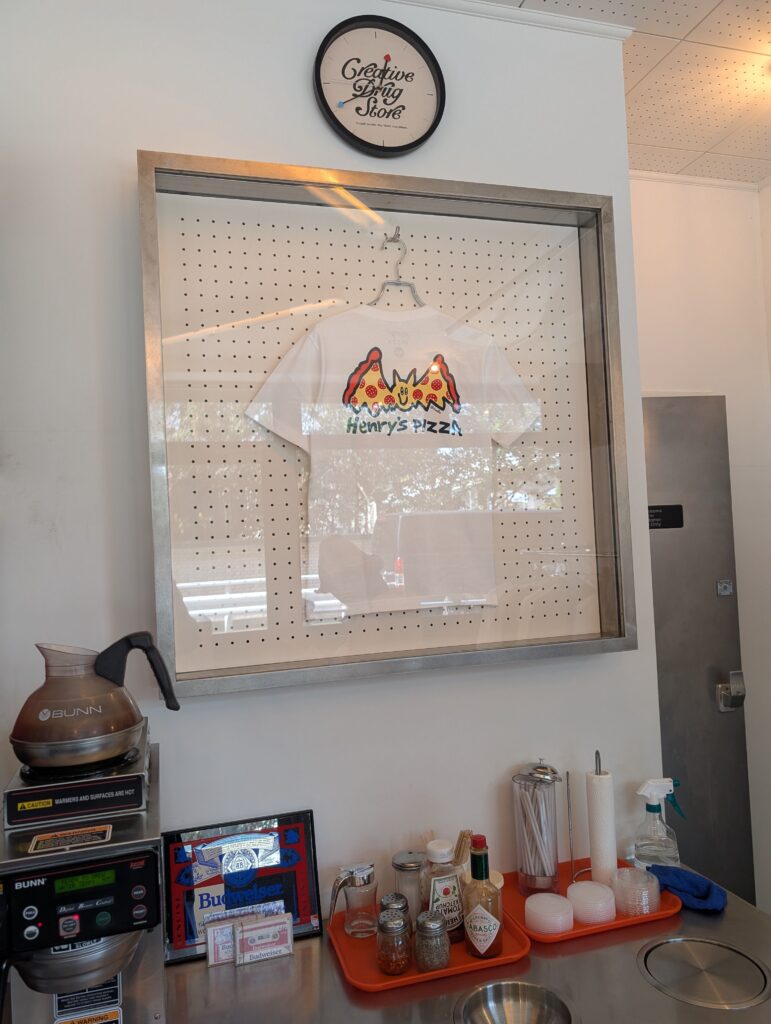 Condiments and straws available next to the soda machine