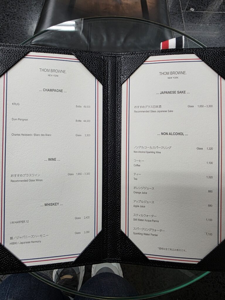 Bar menu featuring champagne and whisky