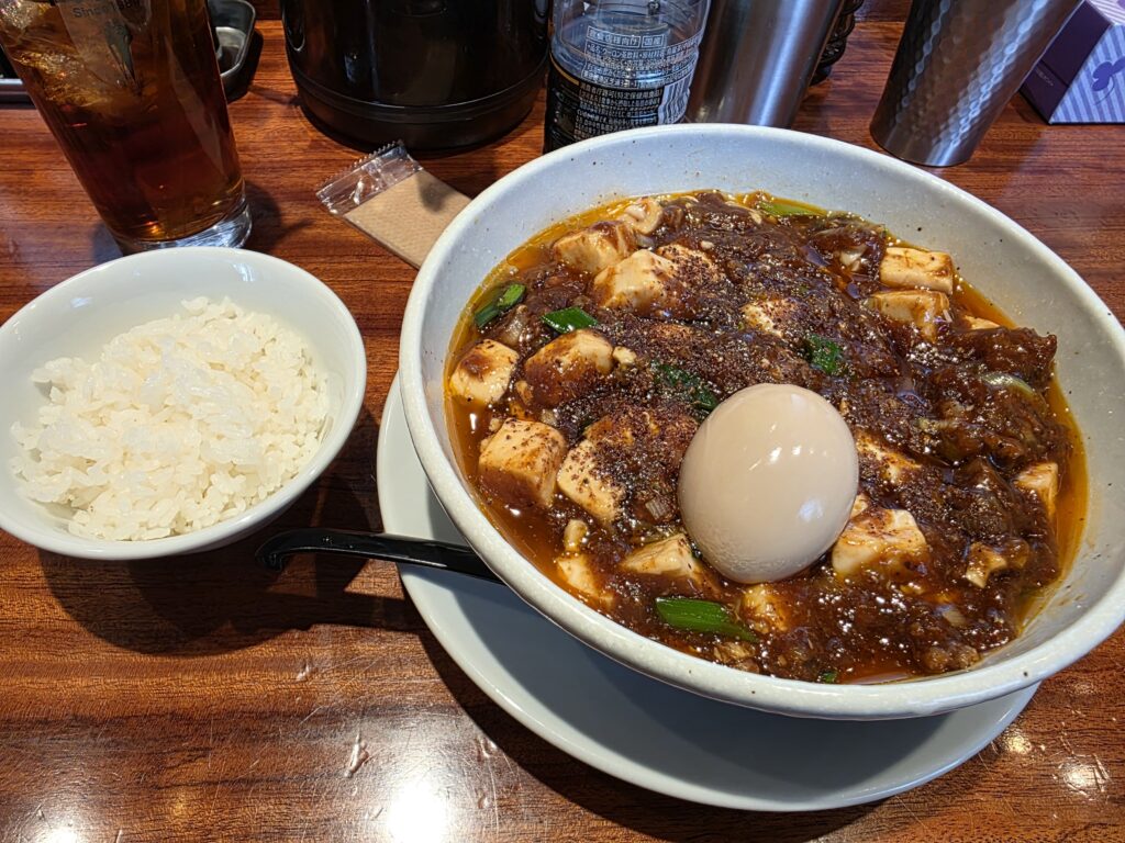 Rosokuya mapo noodles with rice and boiled egg