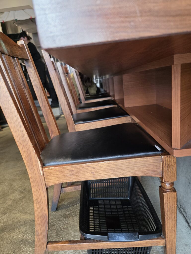 Storage space under the seat for belongings