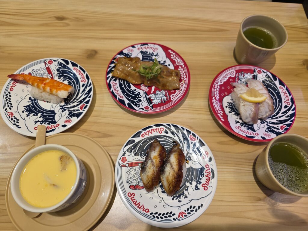 Plates of assorted sushi at Sushiro